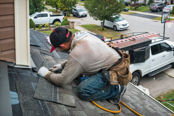Professional Flat Roof Repair technician working in Newfield, NY